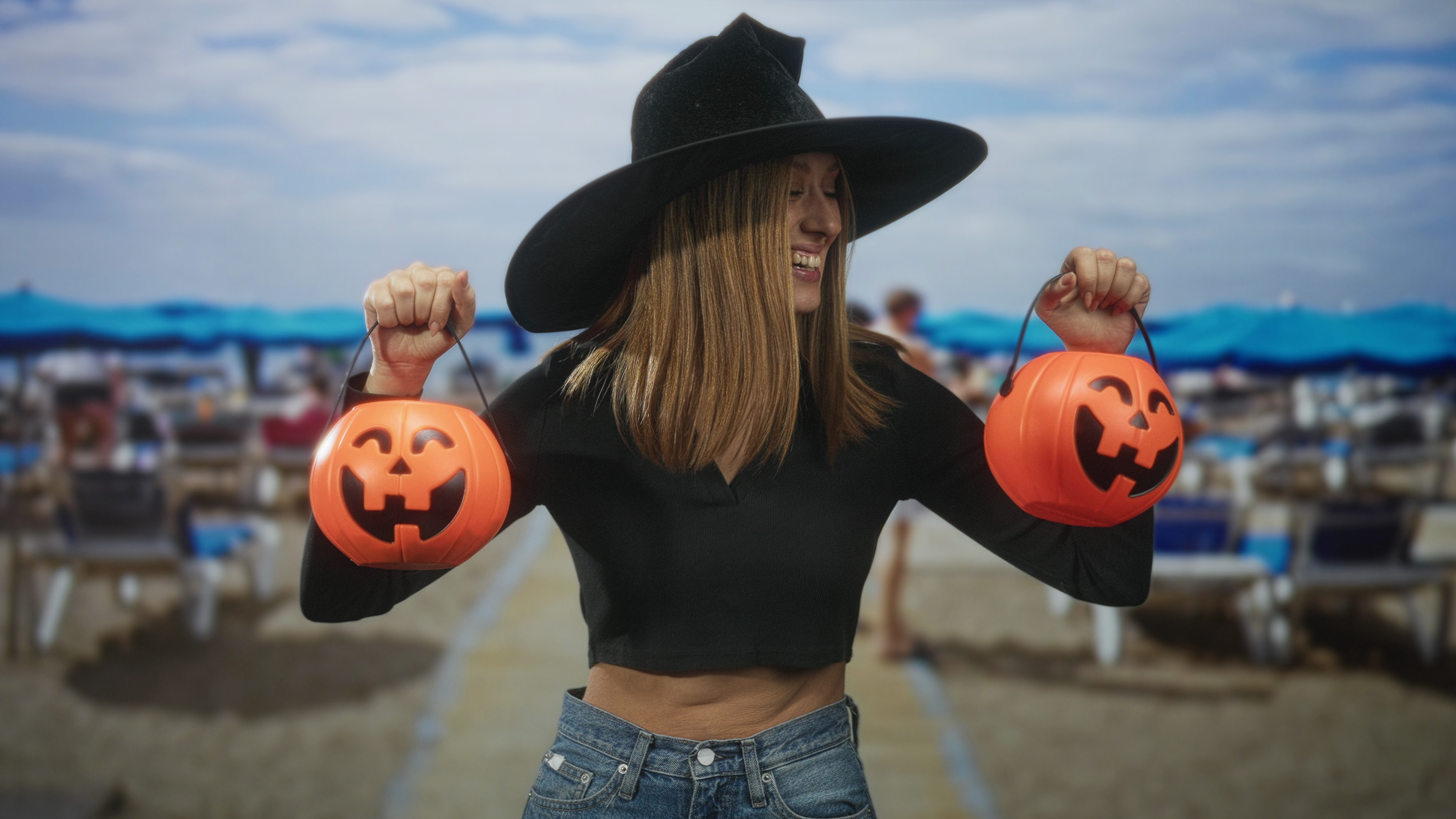 invisalign riverside ca woman on beach with pumpkins